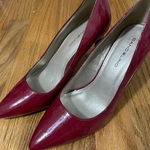 Red patent leather pumps